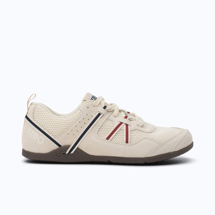 Xero Shoes Prio Men Shoe in Cream with Black and Red Strap, also a Black and Blue Chevron Design on the Side with Toe Facing Right