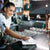 A bartender cleaning the bar